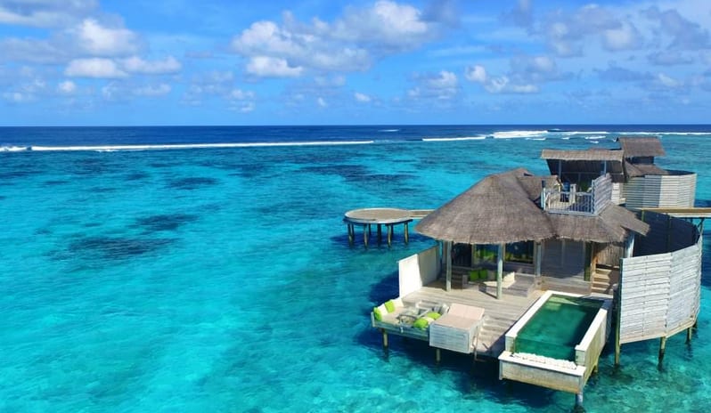 Six Senses Laamu-Sunset Laamu Water Pool Villa aerial view_9321